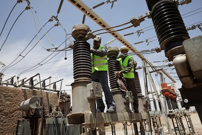 Workers maintain power generation transformers in the Al-Kiswah area of the Damascus countryside, near Damascus. Electricity generation in Syria, which reached about 45 terawatt-hours in 2010, tumbled to under 20TWh by 2015 and did not recover. Reuters